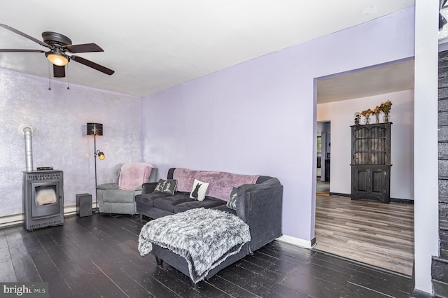 108 Fairfield St, Newville, PA 17241 - living area featuring hardwood / wood-style flooring, a wood stove, and ceiling fan