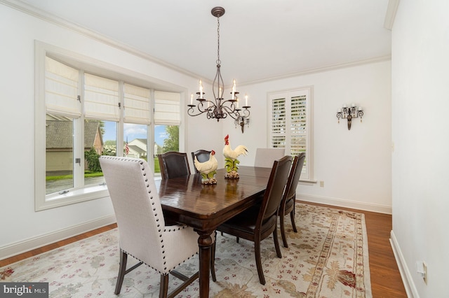 10 Highland Dr, Palmyra, PA 17078 - dining space featuring a chandelier, ornamental molding, light wood finished floors, and baseboards