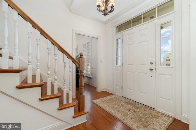10 Highland Dr, Palmyra, PA 17078 - entryway with plenty of natural light, stairway, a chandelier, crown molding, and wood finished floors