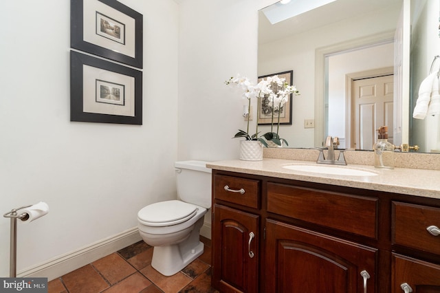 10 Highland Dr, Palmyra, PA 17078 - half bathroom with toilet, vanity, and baseboards