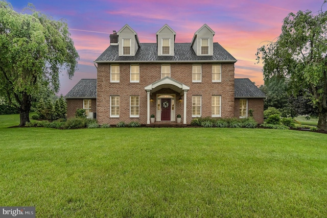 10 Highland Dr, Palmyra, PA 17078 - colonial inspired home with a front yard, brick siding, and a shingled roof