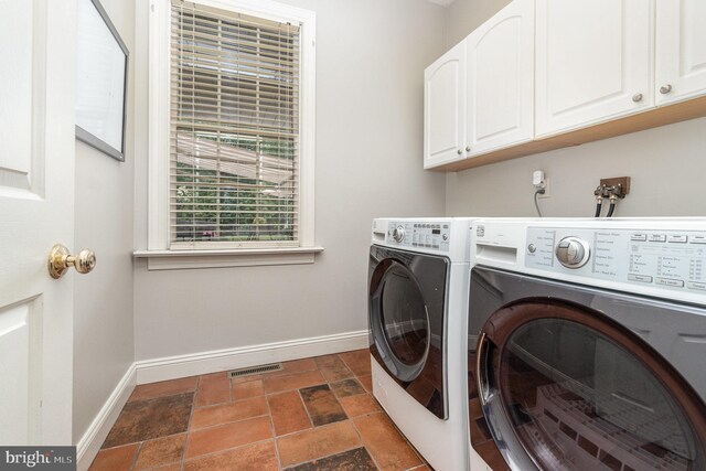 10 Highland Dr, Palmyra, PA 17078 - laundry area with cabinet space, baseboards, independent washer and dryer, and stone finish flooring