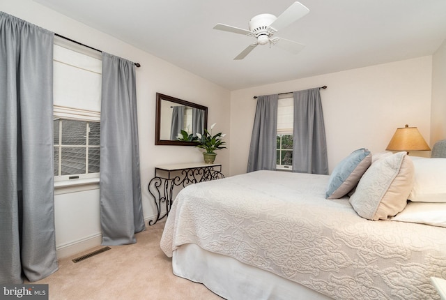 10 Highland Dr, Palmyra, PA 17078 - bedroom with light carpet, baseboards, and ceiling fan