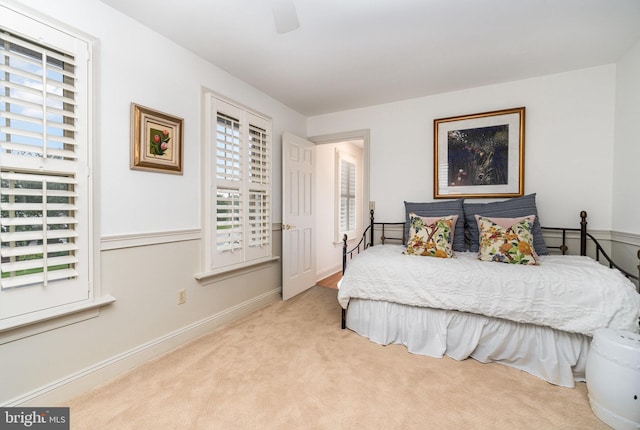 10 Highland Dr, Palmyra, PA 17078 - carpeted bedroom featuring multiple windows, ceiling fan, and baseboards