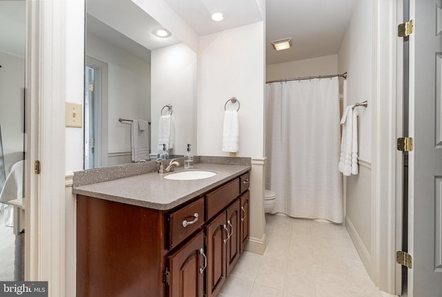 10 Highland Dr, Palmyra, PA 17078 - bathroom featuring toilet, vanity, tile patterned floors, baseboards, and recessed lighting