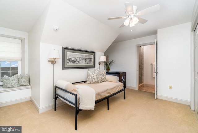 10 Highland Dr, Palmyra, PA 17078 - bedroom featuring light colored carpet, baseboards, ensuite bath, lofted ceiling, and ceiling fan