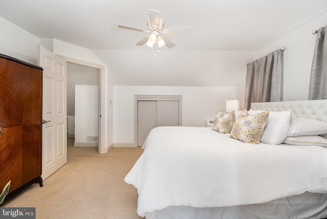 10 Highland Dr, Palmyra, PA 17078 - bedroom with light carpet, vaulted ceiling, a closet, a ceiling fan, and baseboards