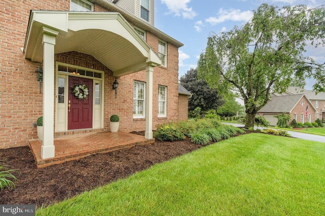 10 Highland Dr, Palmyra, PA 17078 - doorway to property with a yard and brick siding