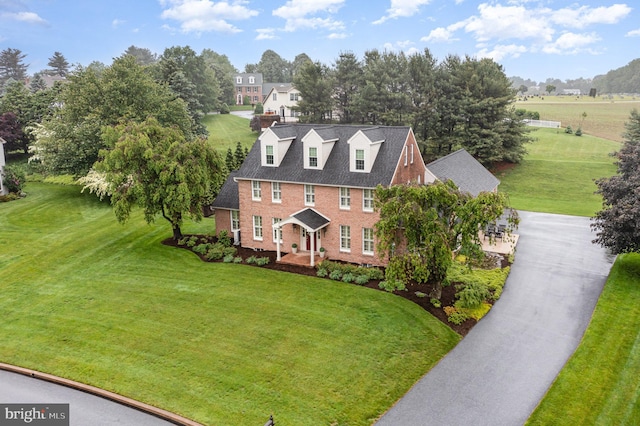10 Highland Dr, Palmyra, PA 17078 - view of front of house featuring brick siding, a front yard, and driveway