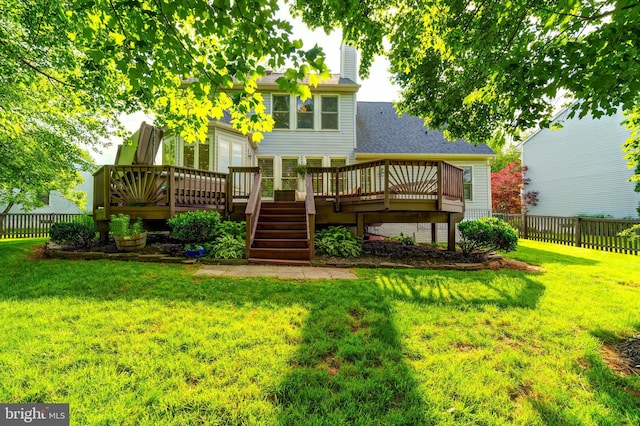 20932 Cox Mills Ct, Ashburn, VA 20147 - rear view of house featuring a fenced backyard, a deck, a chimney, and a shingled roof