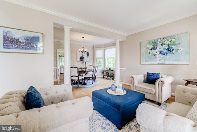 20932 Cox Mills Ct, Ashburn, VA 20147 - living area featuring decorative columns, light wood-style flooring, a chandelier, and crown molding