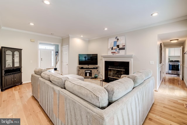 20932 Cox Mills Ct, Ashburn, VA 20147 - living room with light wood-style floors, recessed lighting, crown molding, and a glass covered fireplace