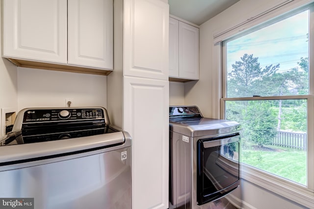 20932 Cox Mills Ct, Ashburn, VA 20147 - laundry area featuring cabinet space and washer and clothes dryer