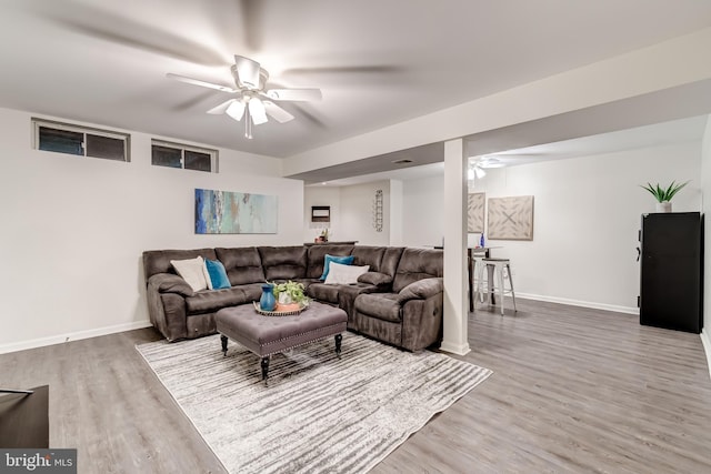 20932 Cox Mills Ct, Ashburn, VA 20147 - living room featuring a ceiling fan and wood finished floors
