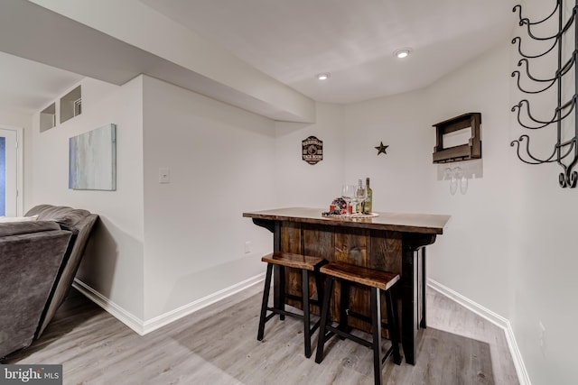 20932 Cox Mills Ct, Ashburn, VA 20147 - indoor dry bar with wood finished floors and recessed lighting