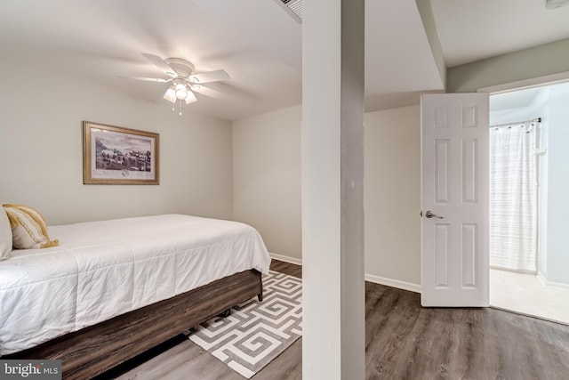 20932 Cox Mills Ct, Ashburn, VA 20147 - bedroom with wood finished floors and a ceiling fan