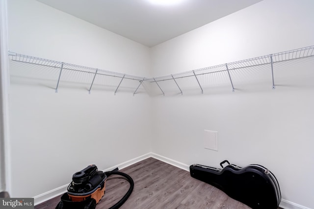 20932 Cox Mills Ct, Ashburn, VA 20147 - spacious closet featuring dark wood-style flooring