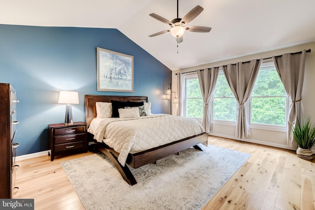 20932 Cox Mills Ct, Ashburn, VA 20147 - bedroom featuring lofted ceiling, light wood-type flooring, and ceiling fan