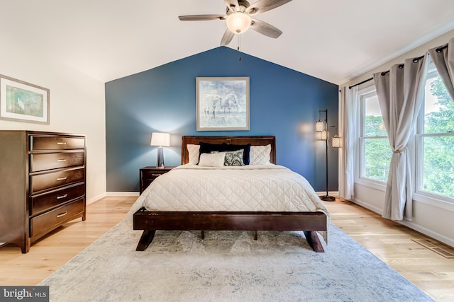 20932 Cox Mills Ct, Ashburn, VA 20147 - bedroom with light wood-type flooring, vaulted ceiling, and a ceiling fan