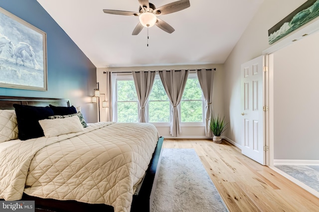20932 Cox Mills Ct, Ashburn, VA 20147 - bedroom featuring lofted ceiling, light wood finished floors, and a ceiling fan