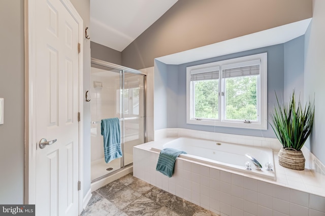 20932 Cox Mills Ct, Ashburn, VA 20147 - full bathroom featuring vaulted ceiling, a bath, and a stall shower