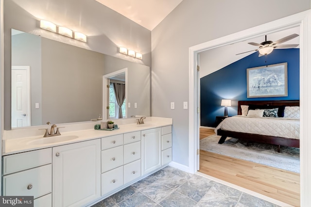 20932 Cox Mills Ct, Ashburn, VA 20147 - ensuite bathroom featuring double vanity, ceiling fan, and lofted ceiling