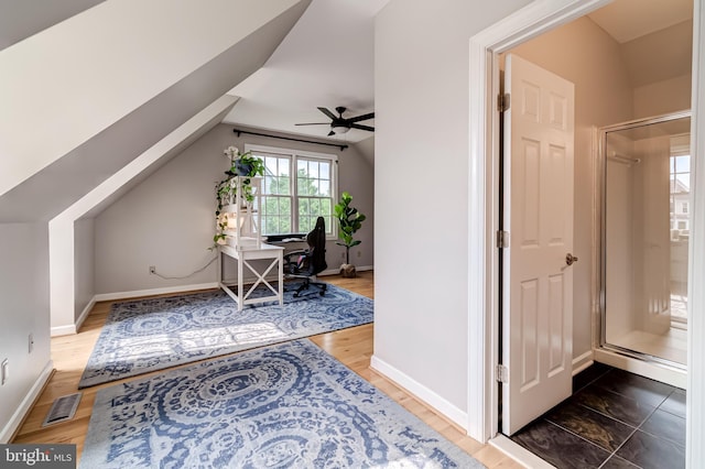 20932 Cox Mills Ct, Ashburn, VA 20147 - home office with vaulted ceiling, a ceiling fan, and wood finished floors