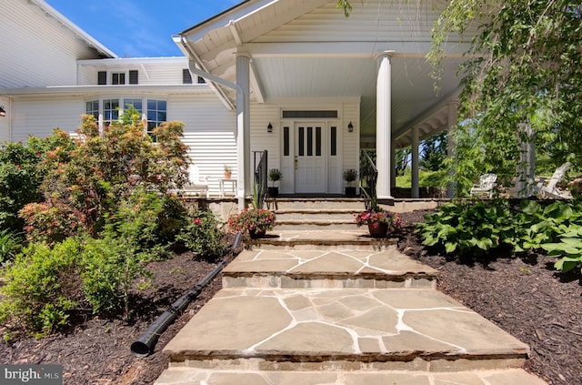 property entrance with a porch