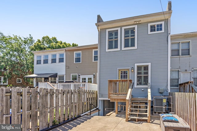 1716 M St NE, Washington, DC 20002 - rear view of property with fence and cooling unit