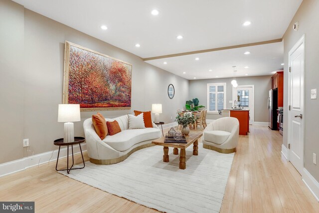 1716 M St NE, Washington, DC 20002 - living room featuring light wood finished floors, baseboards, and recessed lighting
