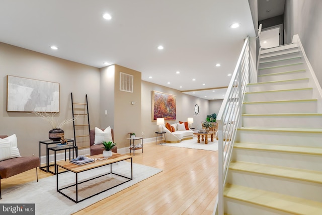 1716 M St NE, Washington, DC 20002 - living area featuring stairway, recessed lighting, light wood finished floors, and baseboards