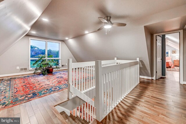 bonus room with ceiling fan, hardwood / wood-style flooring, vaulted ceiling, baseboards, and recessed lighting