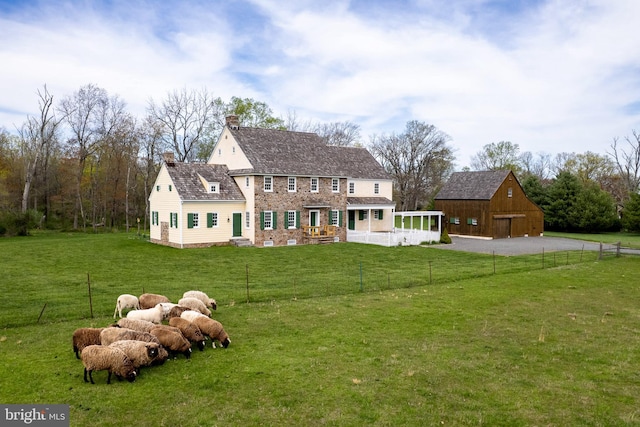 348 Rosemont Ringoes Rd, Stockton, NJ 08559 - back of property with a chimney, an outdoor structure, and a barn