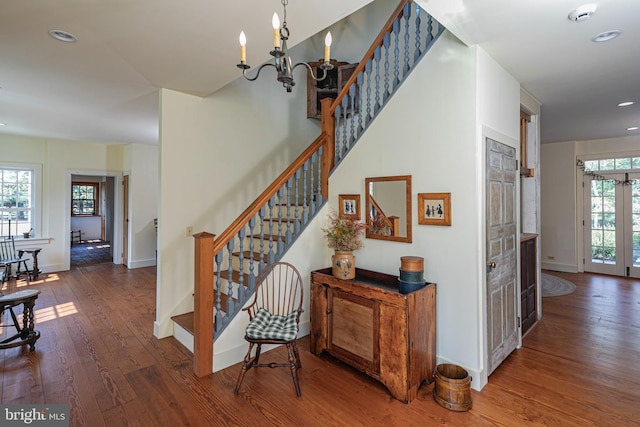 348 Rosemont Ringoes Rd, Stockton, NJ 08559 - stairway with wood finished floors, baseboards, recessed lighting, and a chandelier