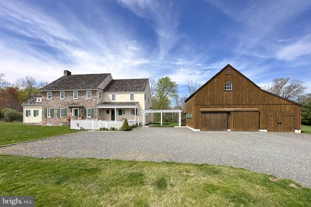 348 Rosemont Ringoes Rd, Stockton, NJ 08559 - colonial inspired home featuring an outdoor structure, a chimney, a detached garage, a front yard, and driveway