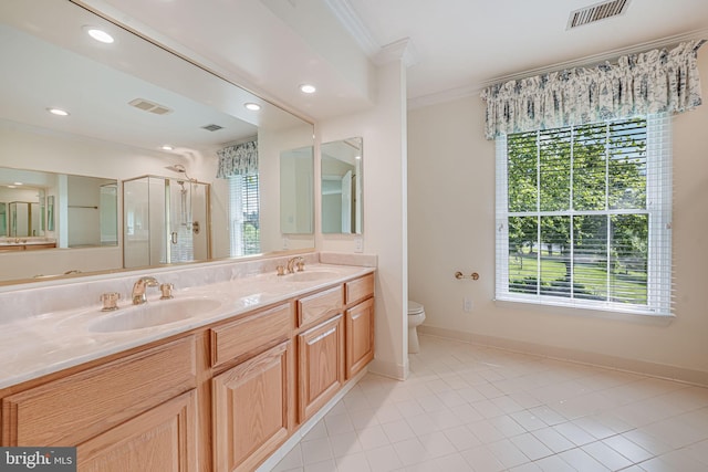 full bath featuring crown molding, a stall shower, toilet, baseboards, and tile patterned floors