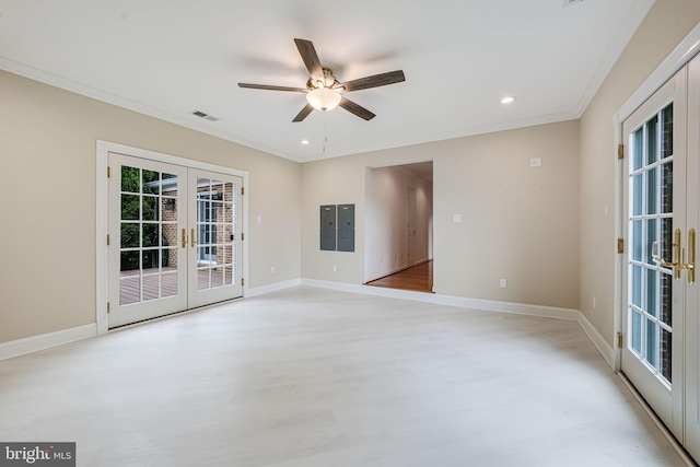 unfurnished room with french doors, crown molding, light wood finished floors, baseboards, and a ceiling fan