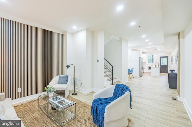 1129 8th St NE, Washington, DC 20002 - living area with stairs, recessed lighting, baseboards, and light wood-type flooring