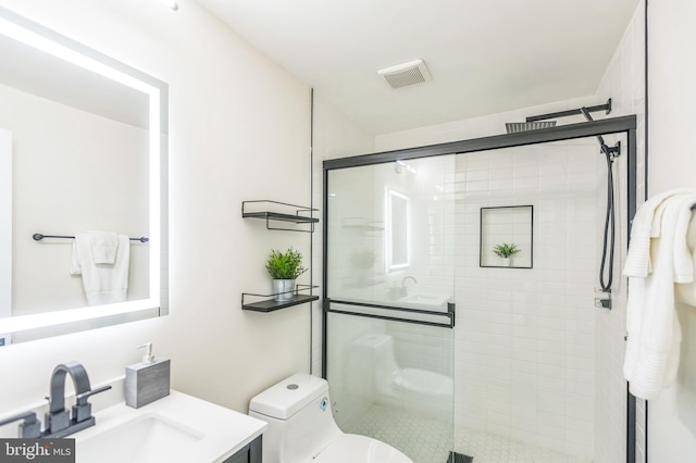 1129 8th St NE, Washington, DC 20002 - bathroom featuring toilet, a stall shower, and vanity