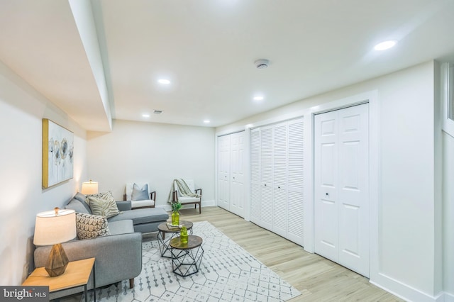 1129 8th St NE, Washington, DC 20002 - living room featuring light wood-style flooring, recessed lighting, and baseboards