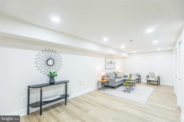 1129 8th St NE, Washington, DC 20002 - living room with wood finished floors, baseboards, and recessed lighting