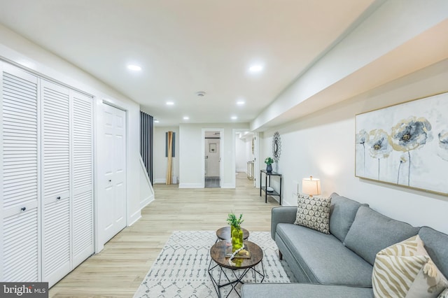 1129 8th St NE, Washington, DC 20002 - living area featuring light wood finished floors, recessed lighting, and baseboards