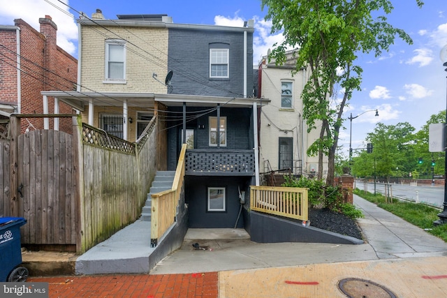 1129 8th St NE, Washington, DC 20002 - view of front of house featuring stairs and brick siding