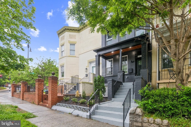 1129 8th St NE, Washington, DC 20002 - view of front facade with covered porch and stairs