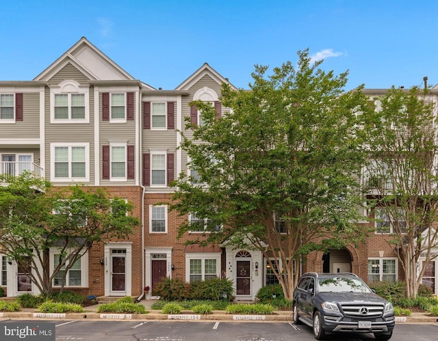5942 Kimberly Anne Way, Alexandria, VA 22310 - multi unit property featuring brick siding and uncovered parking
