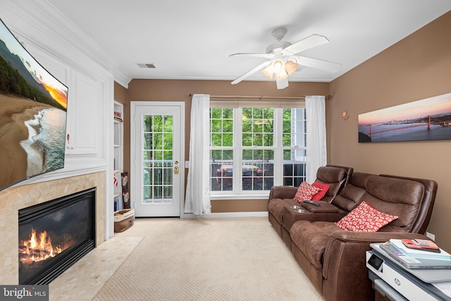 5942 Kimberly Anne Way, Alexandria, VA 22310 - carpeted living area featuring a fireplace, ceiling fan, and crown molding