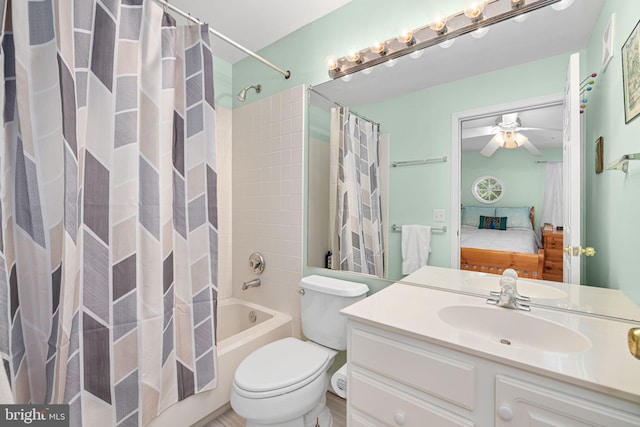 5942 Kimberly Anne Way, Alexandria, VA 22310 - bathroom with ensuite bathroom, vanity, shower / bathtub combination with curtain, a ceiling fan, and toilet
