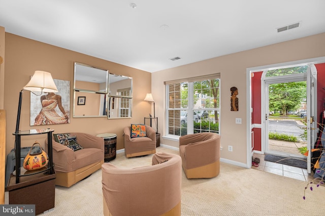 5942 Kimberly Anne Way, Alexandria, VA 22310 - sitting room with carpet floors, healthy amount of natural light, and baseboards