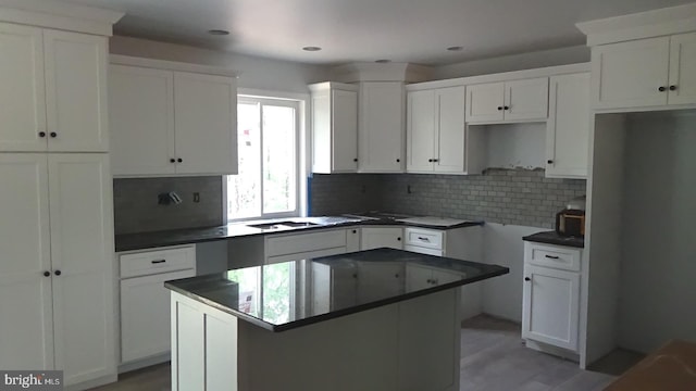 54 Hickory Ridge Rd, Newport, PA 17074 - kitchen featuring a center island, tasteful backsplash, and white cabinetry