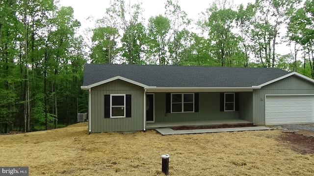54 Hickory Ridge Rd, Newport, PA 17074 - single story home with covered porch, an attached garage, and roof with shingles